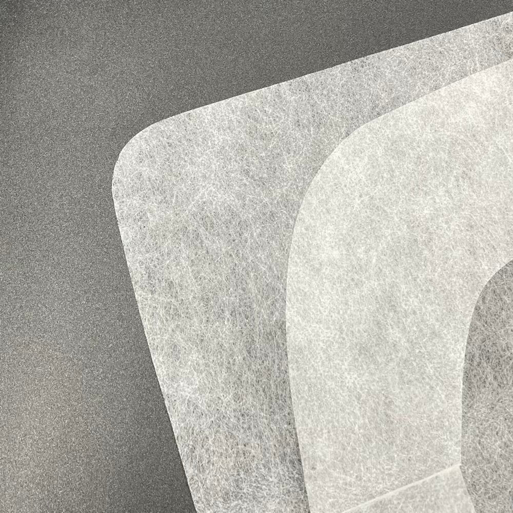 フジ 不織布エプロン F型 8折 白（720×390mm）